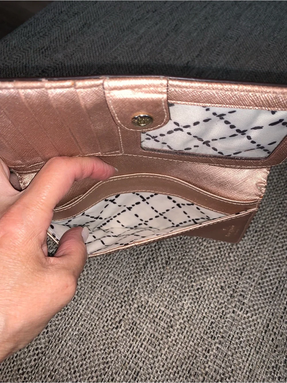 Kate Spade rose gold wallet with callouts